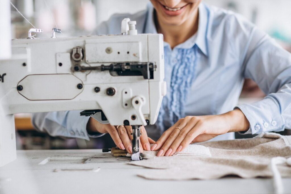 woman-tailor-working-sewing-factory_1303-15842